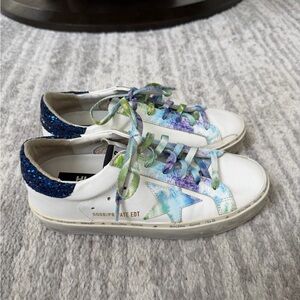 Golden Goose Hi Star sneakers, specifically a tie-dye